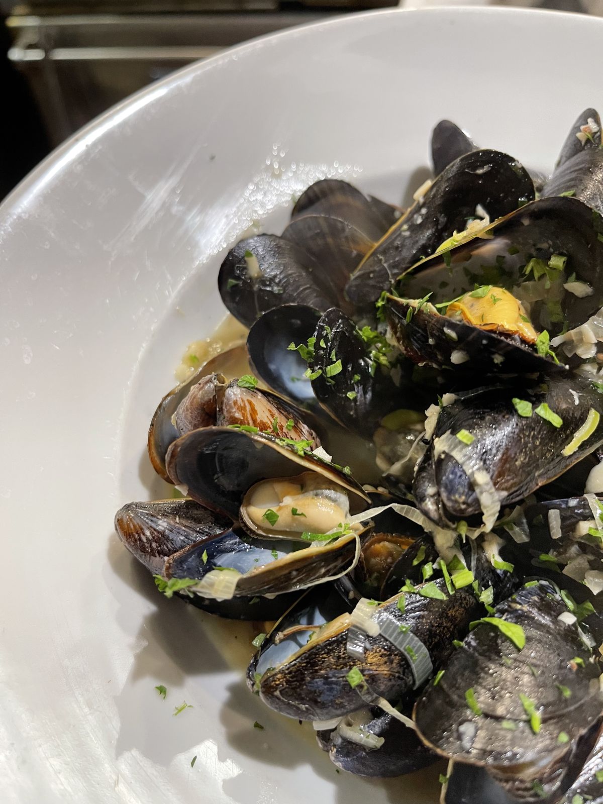 Mussels steamed in white wine with French fries at Bistro Moulin, Monterey